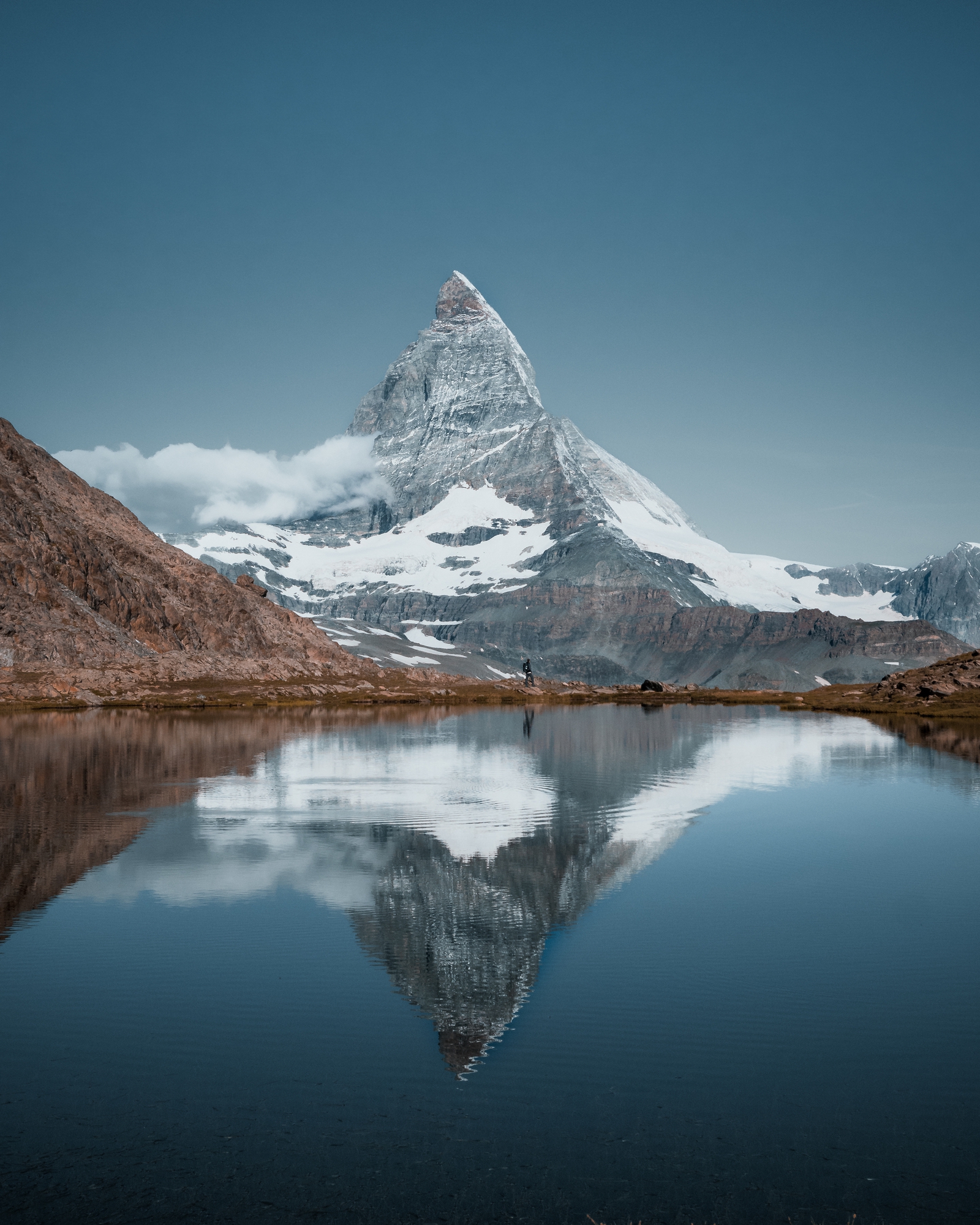beautiful view of the famous riffelsee lake in the matterhorn mountains in switzerland